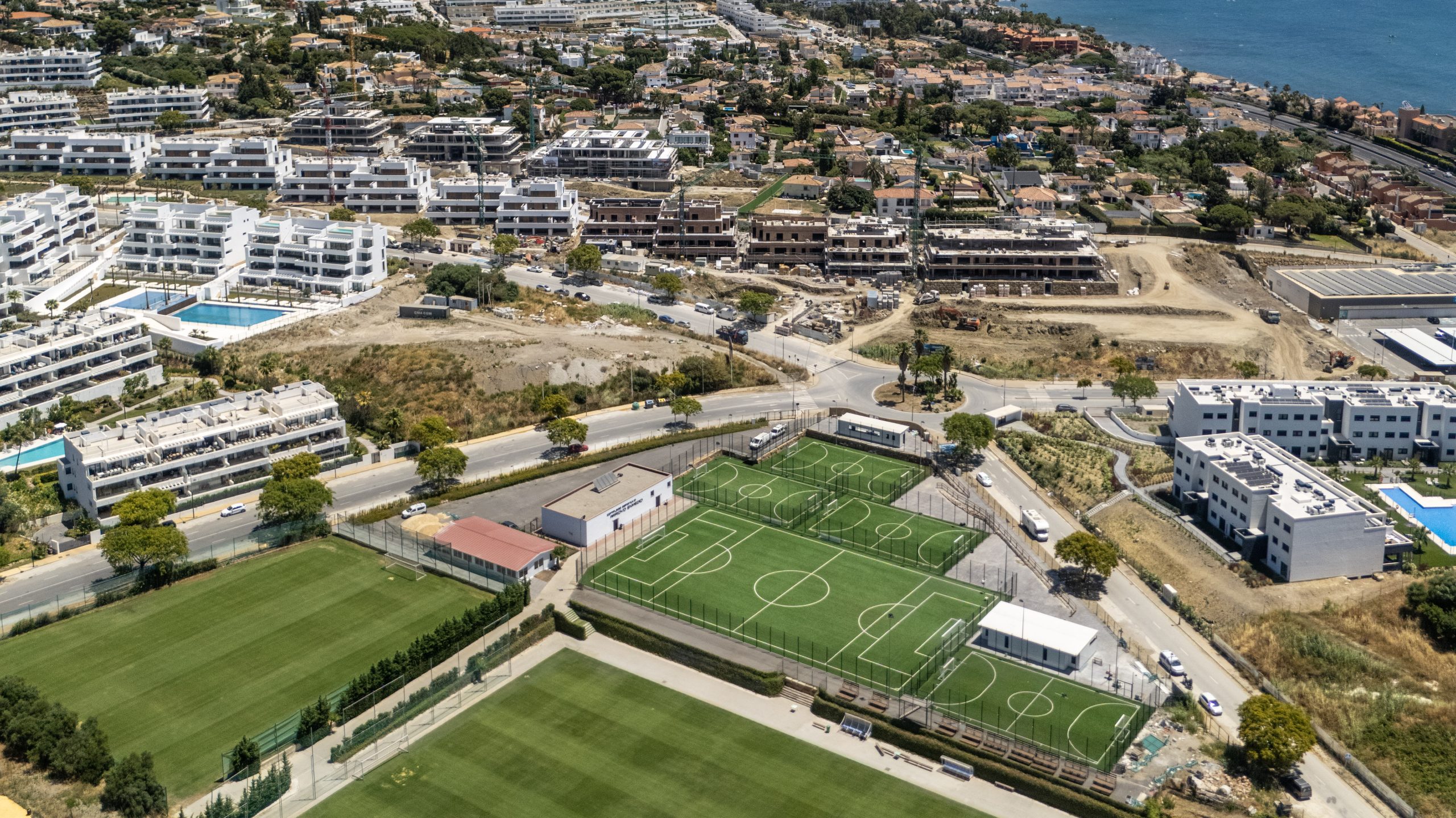 Aerial view of Estepona football pitches and coastline near the Estadio Municipal Francisco Munoz Perez