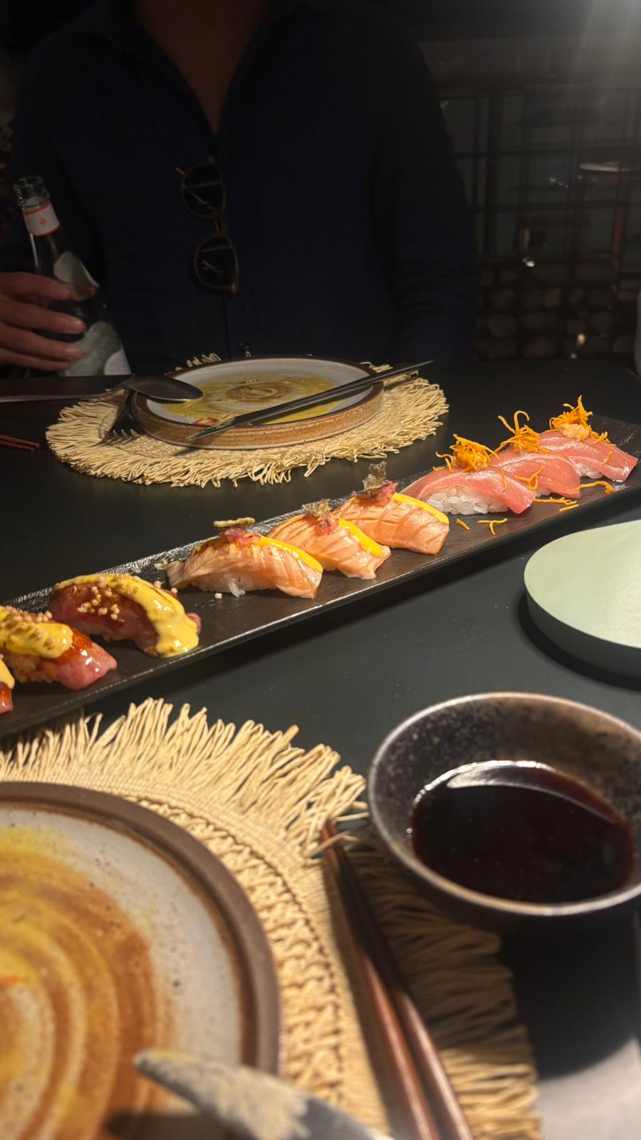 A board of different fish cuts over rice at Kena by Akiro in Marbella