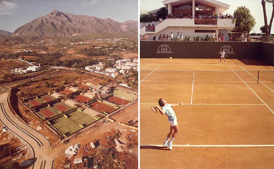 Tennisplätze des Puente Romano Tennis Club im Bau und ein Spieler, der auf dem Sandplatz aufschlägt