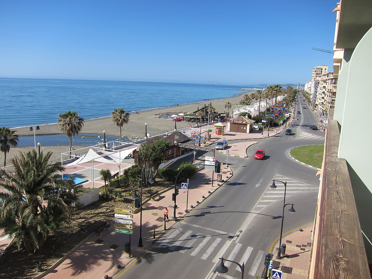Seafront promenade in Estepona with palms, sea view and cafes